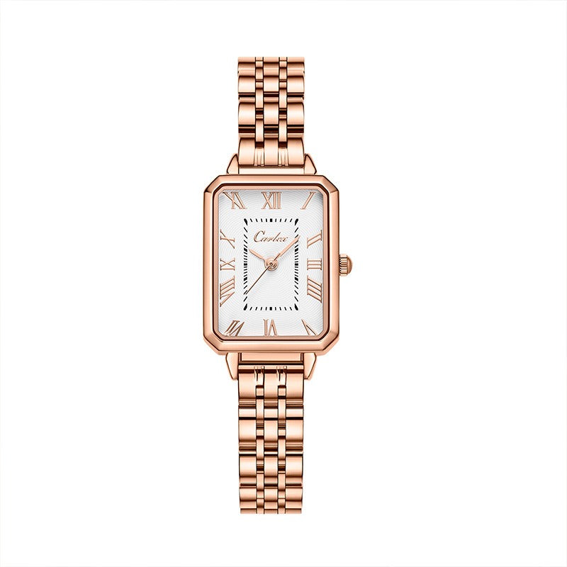 Rose gold tank watch with a white face on a white background