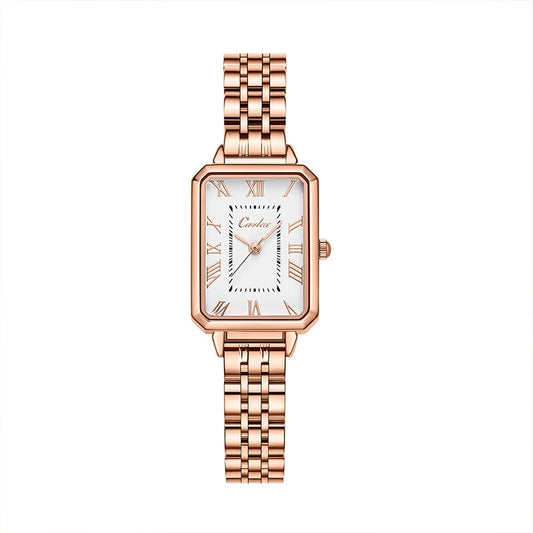 Rose gold tank watch with a white face on a white background